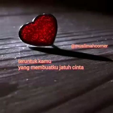 A Red Heart Shaped Object Sitting On Top Of A Wooden Table Next To A Shadow