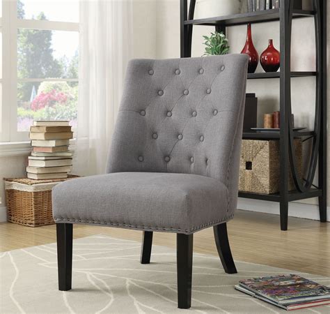 This accent chair sits atop slim metal legs, which wrap around to the back. 902923 Grey and Black Accent Chair from Coaster | Coleman Furniture