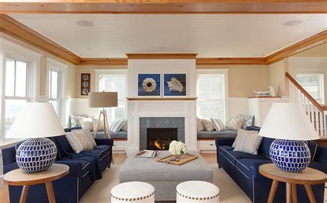 Artwork and centerpieces can also incorporate small dashes of navy blue. Living Rooms Navy Blue Sofa