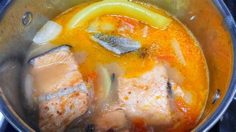 Salmon Tail In Sour Soup Cooking In Action