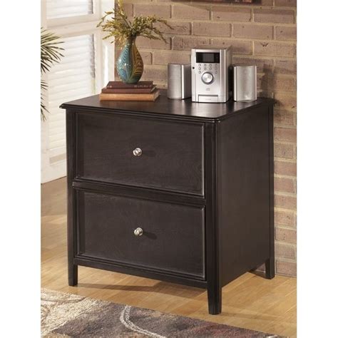 Look at your filing cabinets. Ashley Carlyle 2 Drawer Lateral File Cabinet in Almost ...