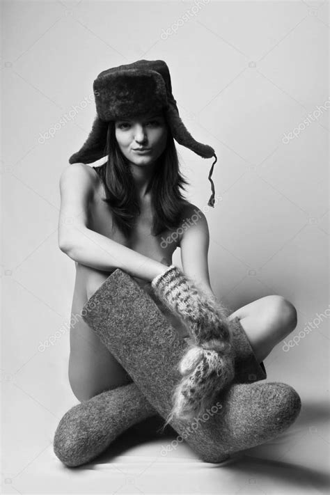 Naked Girl In Boots And A Fur Hat Stock Photo By Radarani