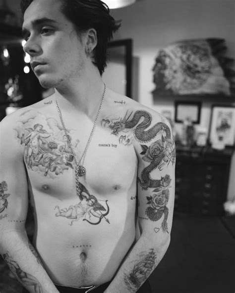 David beckham has quite an extensive body art collection — one that spans more than 40 tattoos starting from his neck all the. Dragon tattoo on Brooklyn Beckham.