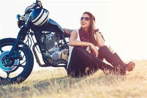 Beautiful Biker Woman Sitting By Her Motorcycle On A Highway Rv Insurance