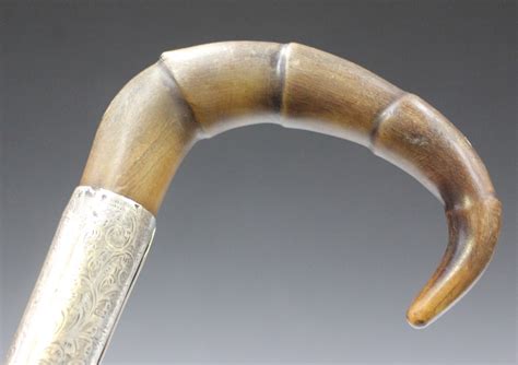 A Late Victorian Rhino Horn Handled Walking Stick The Carved Bamboo