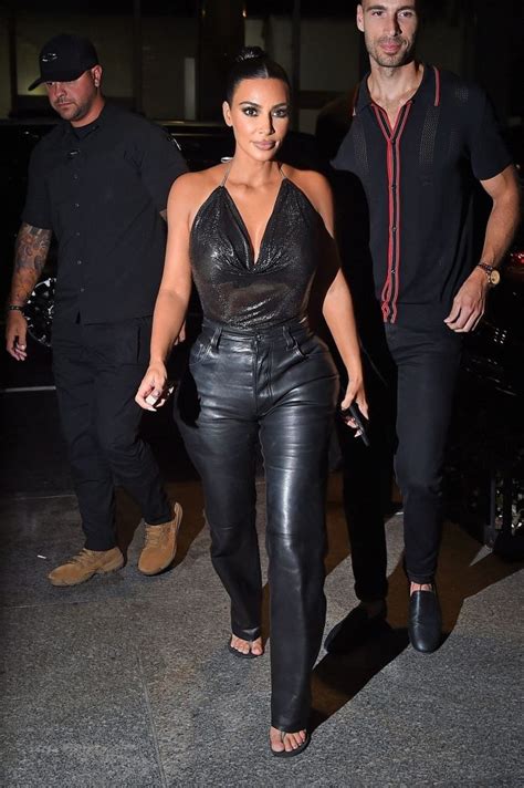 Buxom Brunette Kim Kardashian Showing Her Tits In A See Through Outfit