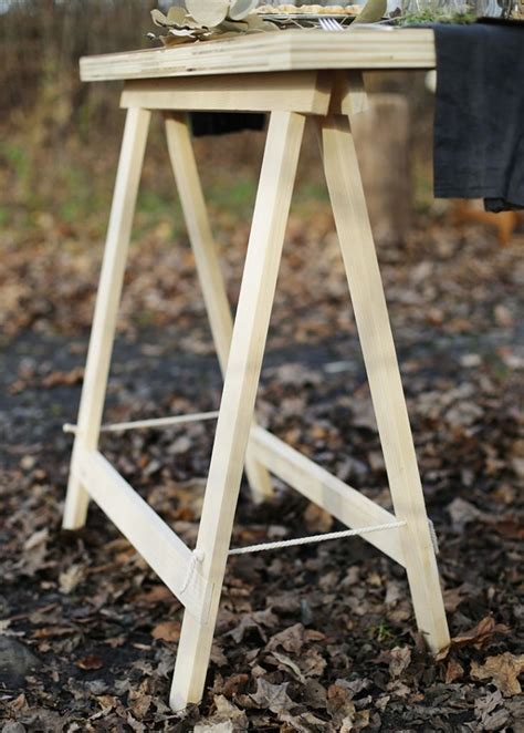 Diy Sawhorse Leg Plywood Table Themerrythought Pallet End Tables