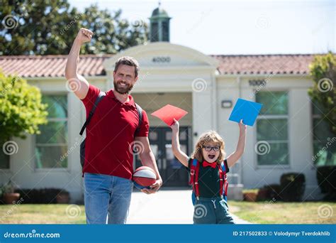 Excited Father Walking Son To School Amazed Parent And Pupil Of