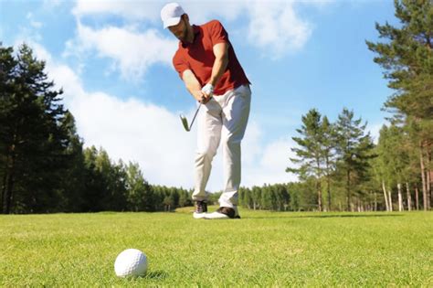 Premium Photo Athletic Young Man Playing Golf In Golfclub