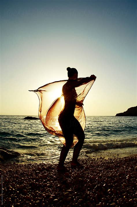 Woman Silhouette On The Sunset Near The Sea Del Colaborador De Stocksy Marija Anicic Stocksy