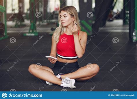 Sports Blonde In A Sportswear Have A Rest In A Gym Stock Photo Image
