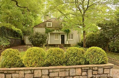 A Stone Wall And Boxwood — Perfection Circle Drive Stone Planters