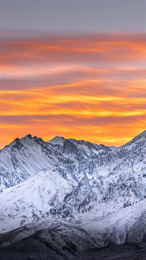 Download Wallpaper 720x1280 Sunset Mountains Peak Sky Nature