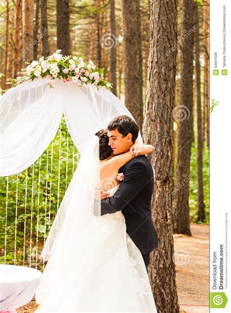 Couple Getting Married At An Outdoor Wedding Stock Image Image Of Flowers Marry 64651539
