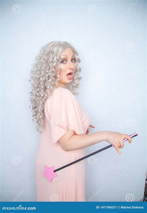 Kinky Pretty Woman With Pink Star Riding Crop Cute Blonde Woman Holds