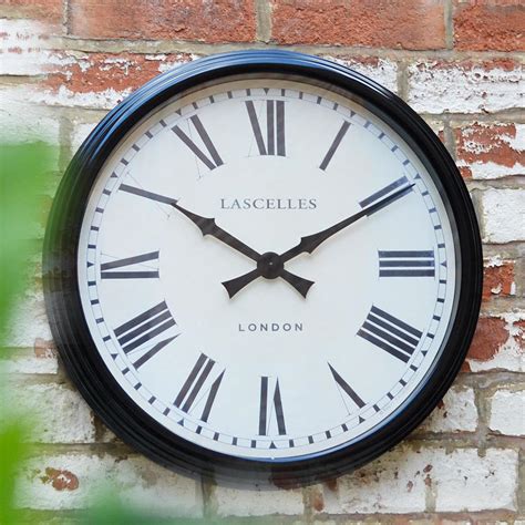 Buy Large Black Cased Metal Wall Clock — The Worm That Turned