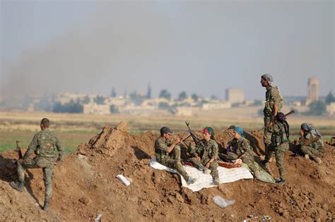Kurds And Syrian Rebels Storm Isis Held Border Town The New York Times