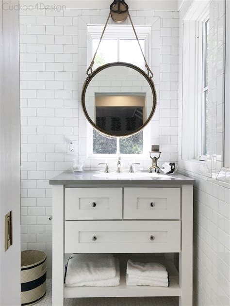 This method, of hanging a large bathroom vanity mirror the way the professionals do it, will have a fantastic impact on your entire bathroom, no matter its size or style. Southern Living Idea House 2017 (part 1) | Bathroom mirror ...