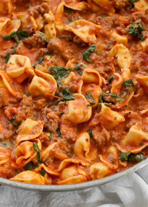 Sausage Tortellini And Spinach In A Creamy Tomato Sauce