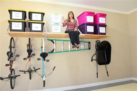 A hoist is a great way to create garage storage overhead or for garage bike storage.a plastic grillwork screwed into the corner of a garage or basement under the ceiling will be great to store pvc pipes, baseboards, profil Impressive Garage Shelving #7 Diy Overhead Garage Storage ...