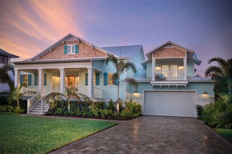 All beach and coastal homes incorporating piers or piles are built to weather the unique elements a. Beach House Plans: Escape the Cold with These Warm Designs ...