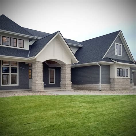 Families love the updated farmhouse look with modern amenities. Modern Craftsman Exterior Veneer Stone Home Buechel Stone ...