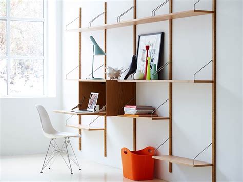 Shelves come in three widths options: Royal System shelving, designed by Poul Cadovius in 1948 ...