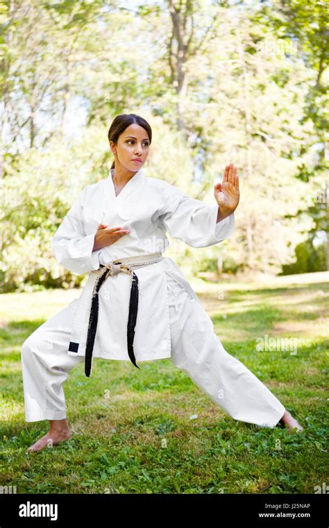 A Shot Of An Asian Woman Practicing Karate Stock Photo Alamy