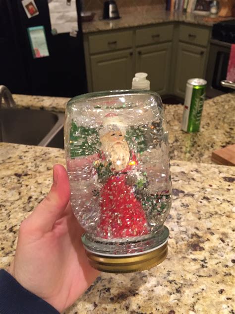 Diy Snow Globe Made With Water Caro Syrup Glitter And Plastic Santa