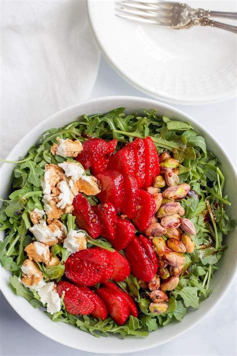 Baby Arugula Strawberries Pistachios And Goat Cheese All Drizzled