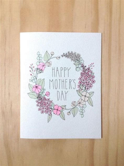 A Card That Says Happy Mothers Day With Pink Flowers And Green Leaves