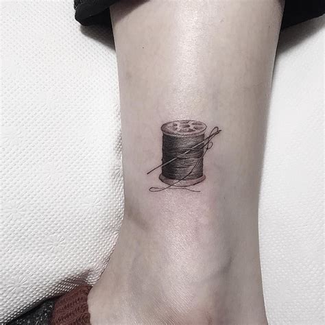 Needle And Thread Tattoo By Nando Tattoo Dad Tattoos Foot Tattoos