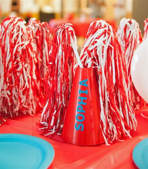 Megaphones And Pom Poms Table Decorations And Favors At Cheerleading