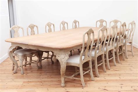 Lot 24 A Large Limed Oak Dining Table