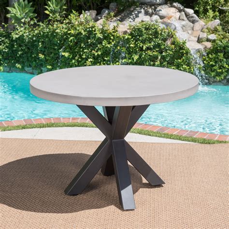 Carina Outdoor Light Weight Concrete Circular Dining Table With Black Iron Cross Pedestal Base