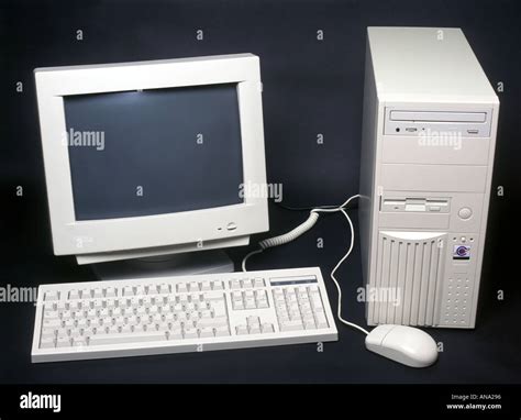 Typical Desktop Computer With Crt Monitor Keyboard And Mouse Stock