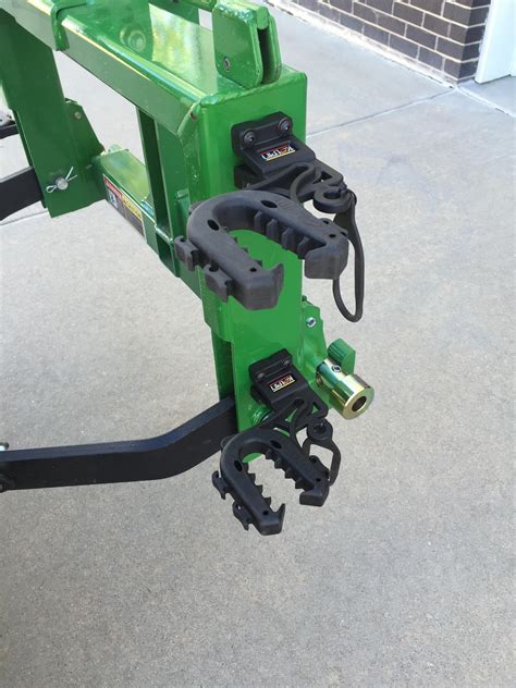 Tool Holders On Rear Quick Hitch