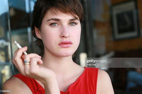Woman Smoking Outside Coffee Shop High Res Stock Photo Getty Images