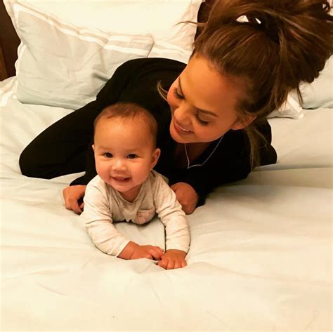 Chrissy Teigen Goes Off After Being Accused Of Holding Luna Wrong Us Weekly