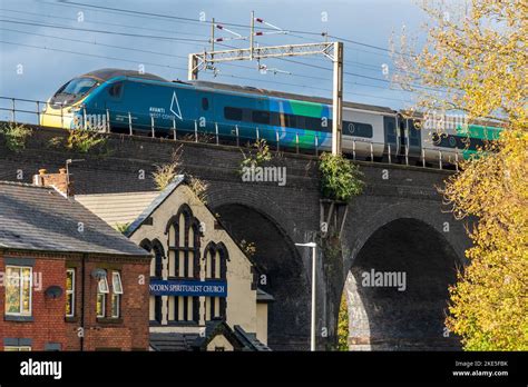 Avanti Pendolino Opportuniy Climate Train Passing Over The Viaduct In