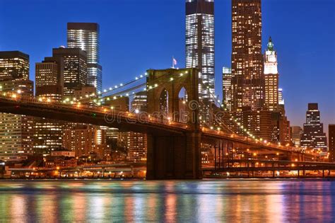 Brooklyn Bridge With Lower Manhattan Skyline At Night Stock Photo