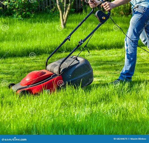 Man With Lawnmower Stock Image Image Of Motor Cutter 68244675