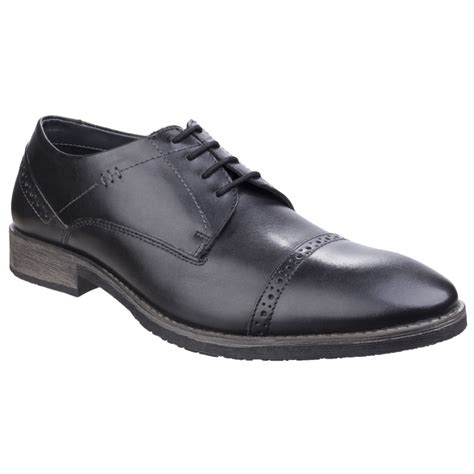 Hush puppies shoes were first designed for young american families, who wanted to go from a conservative & uniform culture to a more casual & free lifestyle. Hush Puppies Mens Craig Luganda Black Leather Formal Shoes