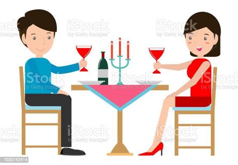 couple having romantic dinner by candlelight couple having dinner in a restaurant man and woman