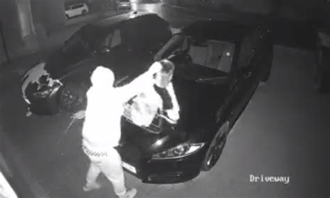 Video Brazen Vandal Caught On Cctv Pouring Paint Over Cars In Kelty