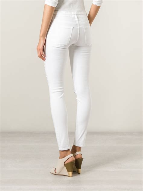 Frame Denim Distressed Skinny Jeans In White Lyst