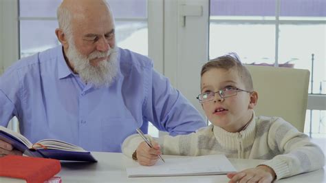 Grandson Asks Grandpa To Help With Homework Stock Footage Sbv 322760089 Storyblocks