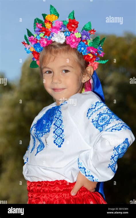Girl In Traditional Ukrainian Dress At Pyrohovo State Museum Of Folk Architecture And Life Of