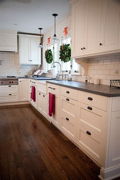 Shop our wide range of kitchen cabinets at warehouse prices from quality brands. White cabinets honed slate counter tops, and black handles ...
