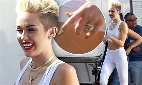 Miley Cyrus Defiantly Flashes Her Engagement Sparkler As She Slips Into Tight White Lycra